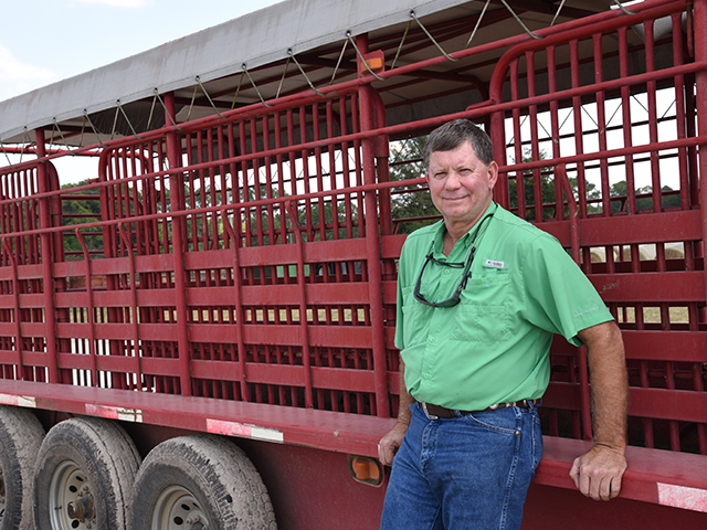 Stockyard owner Allen Wiggins says it&#039;s important to make sure stock trailers are safe and hauling weight limits are followed. (DTN/Progressive Farmer photo by Becky Mills)